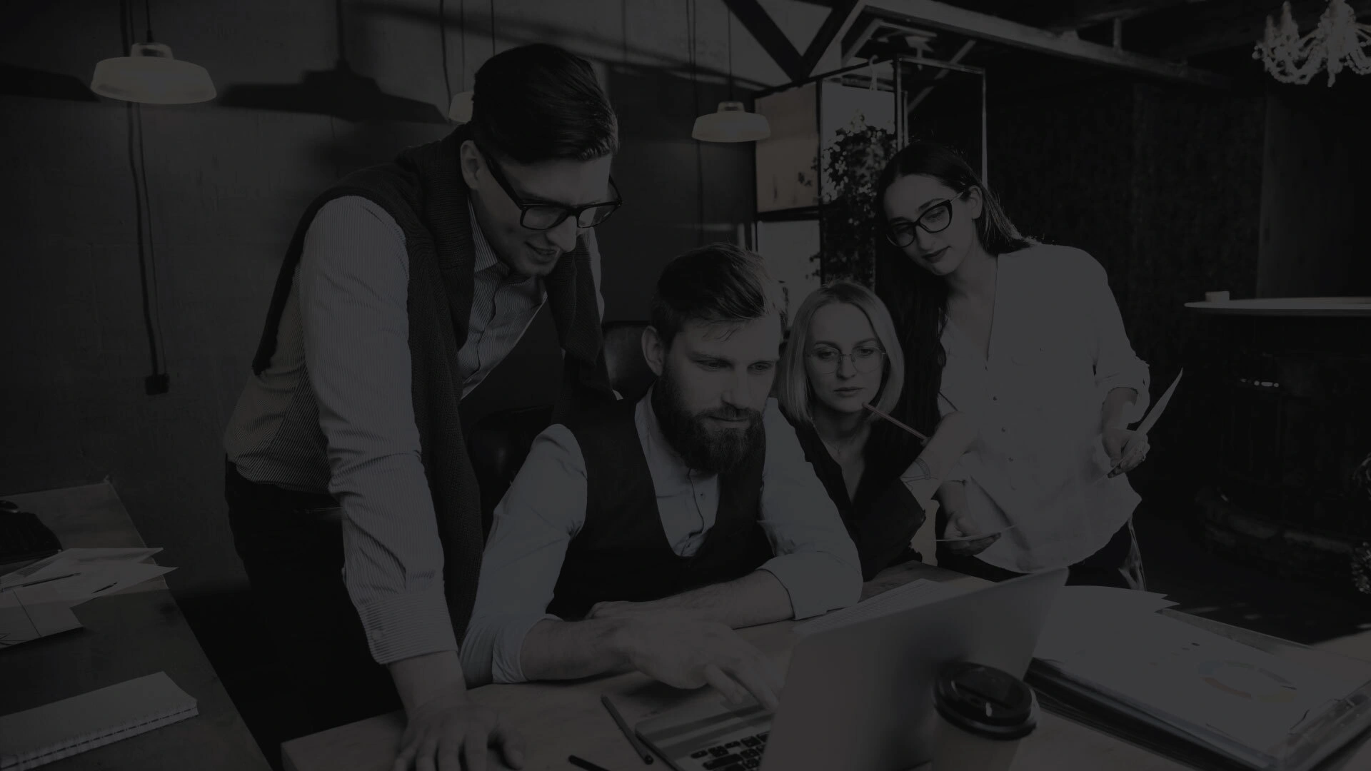 The Website Providers design team reviewing logo concepts together